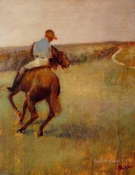 Jinete de azul sobre un caballo castaño Edgar Degas Pinturas al óleo